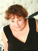 This naughty housewife loves to get wet on her own