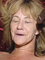 This nasty mama loves three black cocks at once