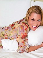 Sweet mom in a pink thong puts her juicy ass on display for you