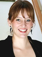 Anilos Justine flaunts her medium sized boobs as she slips off her evening wear