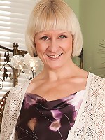 Hot Anilos granny wears stockings as she shows off her naked body