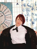 Redhead Anilos stewardess flaunts her big jugs in a bra