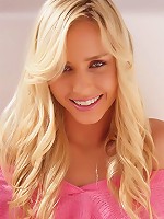 Naughty petite coed Kara Duhe relaxing on the floor touching and rubbing her slippery pussy