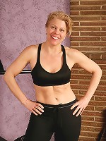 Athletic Lauren E from AllOver30 works the weights and her pussy