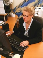 Horny mature office chick can\'t wait to show you what\'s in her panties