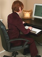 Short haired MILF with a shaved pussy spreads her legs at work