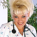 Mature blonde nurse slide out of her uniform and smiles