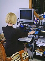 Blonde office MILF strips and spreads her ivory legs