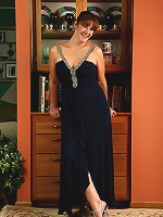 35 year old redheaded Julie slips out of her elegant dress and spreads