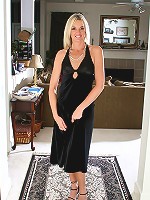 Elegant Layla in a long black gown gives us some upskirt thrills