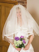 52 year old Hazel pulls off her wedding dress and spreads her ass