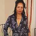 Ebony MILF Sunshine M flaunts her dark and meaty pussy for you