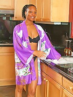 37 year old ebony chick gets naughty in the kitchen
