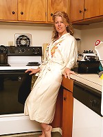 Blonde mature housewife Lauren E gets down and dirty in the kitchen
