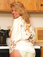 Blonde mature housewife Lauren E gets down and dirty in the kitchen