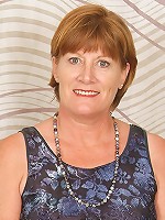 Playful 47 year old MILF spreads her mature legs for the camera