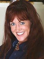 Long haired 40 year old Shauna pinches her nipples just for us