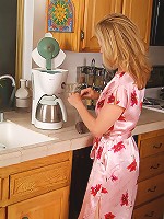 Gorgeous 54 year old getting naked in the kitchen here