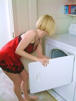 Blonde MILF gets hot doing laundry so she strips naked