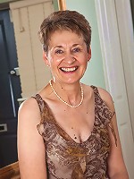 60 year old Dee shows off her shaven mature pussy in this one