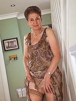 60 year old Dee shows off her shaven mature pussy in this one