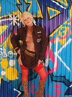 Gorgeous MILF Sally T in red panties and see through top posing