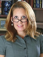 Gorgeous older secretary Lilly gets naked in the office.