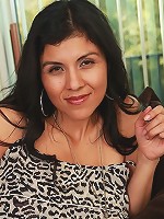 Busty Latin MILF Sofia Reyes spreads her pussy lips.