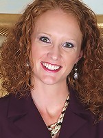 Small breasted curly redhead Ande exposes her older pussy.