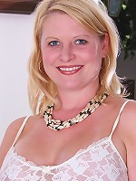 Busty mature amateur Lynn Miller peels off lingerie.