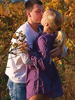 This blonde nympho had a secret for her lover. Underneath her dress, she wasn't wearing any panties and she wanted him to take advantage of the easy access even though they were outdoors.