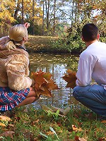 This blonde nympho had a secret for her lover. Underneath her dress, she wasn't wearing any panties and she wanted him to take advantage of the easy access even though they were outdoors.