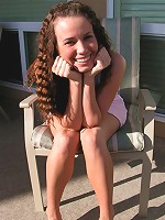 Bruntte teen with crimped hair and big tits