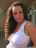 Bruntte teen with crimped hair and big tits