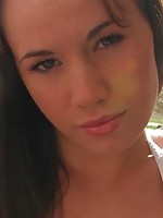 Busty brunette teen in a white bikini