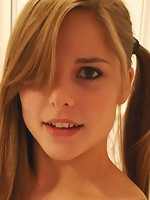 Cute and innocent dirty blonde in pigtails