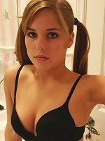 Cute and innocent dirty blonde in pigtails