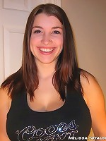 Melissa sheds her denim skirt to reveal her full moon ass