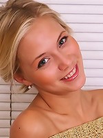 Maddie in a green mesh top exposing boobs