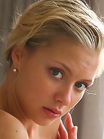 Perfect blonde teen lets small tits slip out