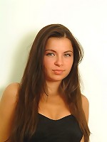 Brunette teen in a dress so short you see her kooch!