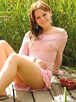 Petite brunette girl spreads to show her sweetness