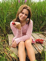 Petite brunette girl spreads to show her sweetness