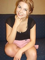 Beatrix undresses on her sofa