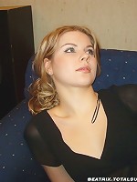 Beatrix undresses on her sofa