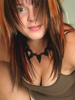 Brunette spreads on the stairs