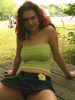 Abrianna teases us in these outdoor pics in a tithugging top