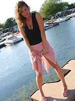 Jade posing in a long skirt outdoors