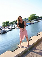 Jade posing in a long skirt outdoors