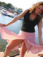 Jade posing in a long skirt outdoors